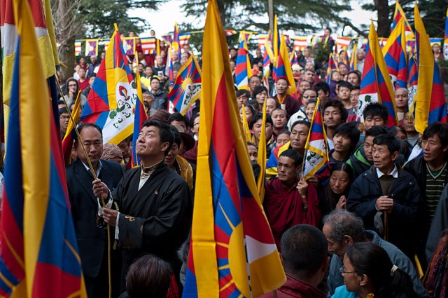 Kalon Tripa Dr. Lobsang Sangay, political head of the Tibetan people, unfurls and raises the Tibetan National Flag on the 53rd National Uprising Day on March 10, 2012 in Dharamsala, India. Tibetan people are demanding their Right to Natural Freedom that was taken away by the military occupation of their Land. Freedom in Tibet is about oppression caused by foreign occupation.