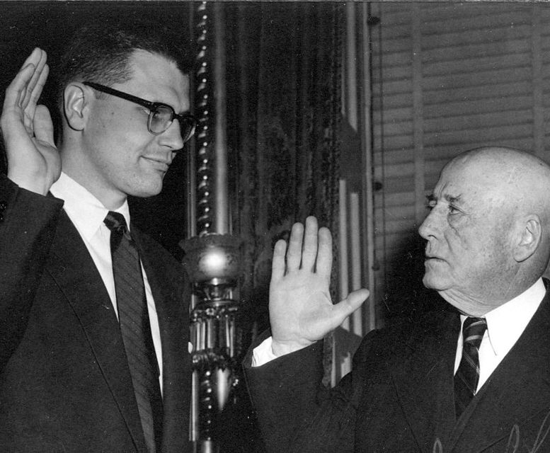 Whole Dude-Whole Representative: Representative John Dingell with the Speaker of the House Sam Rayburn taking his oath to the office in 1955.